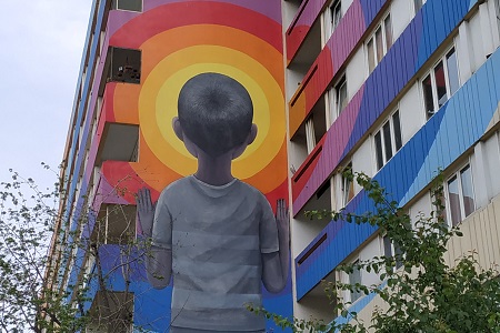 photo of the street art fresco in Paris 13 by Seth, entitled: Child in Shorts