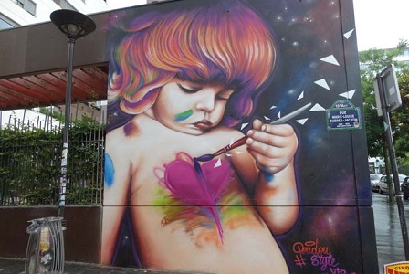 photo de la fresque de street art prise à Paris 13e de Doudou style, intitulée : peinture enfantine