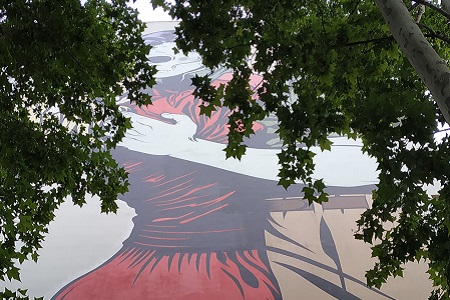 photo of the street art fresco in Paris 13 by D*Face, entitled: Love Won’t Tear Us Apart