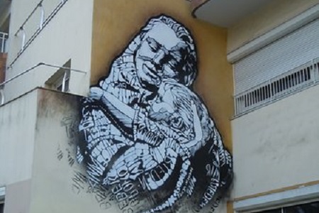 photo of the street art fresco in Paris 13 by C215, entitled: Mother and Child